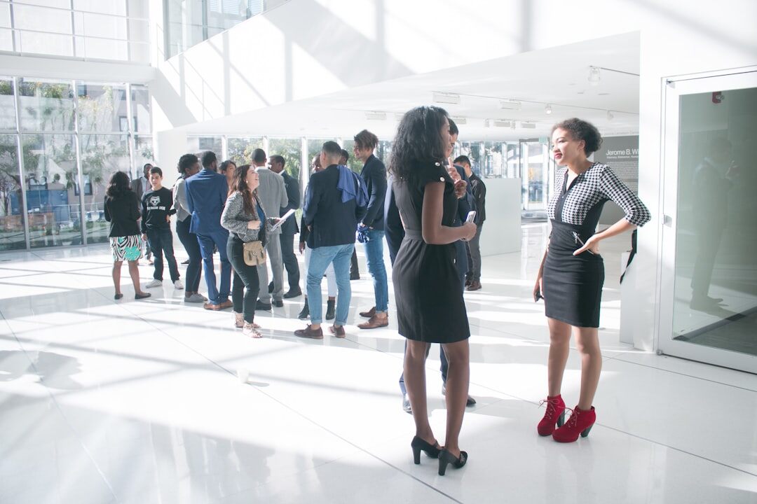 Professionals talking at a business networking event